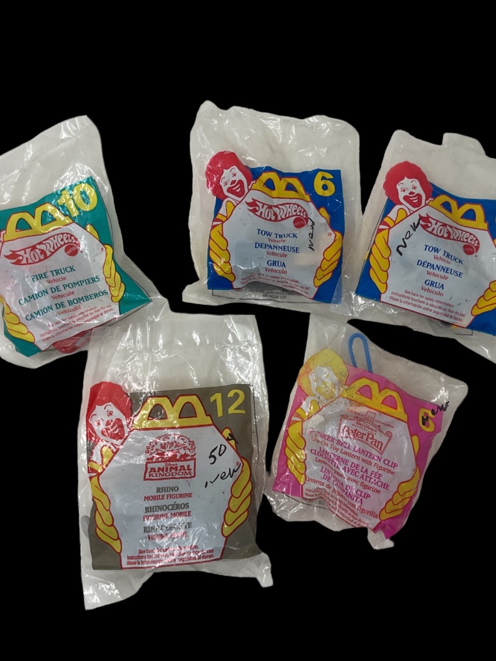 Lot of five vintage, sealed McDonald's Happy Meal toys from the late 1990s